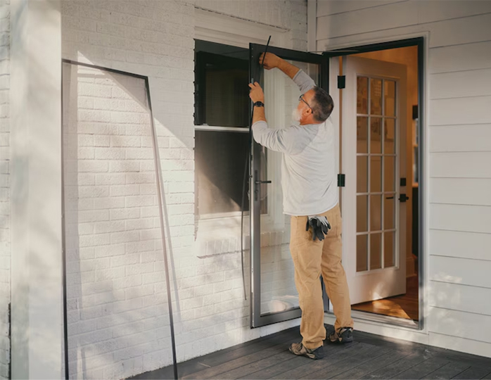 BWJ Storm professional installing new storm door